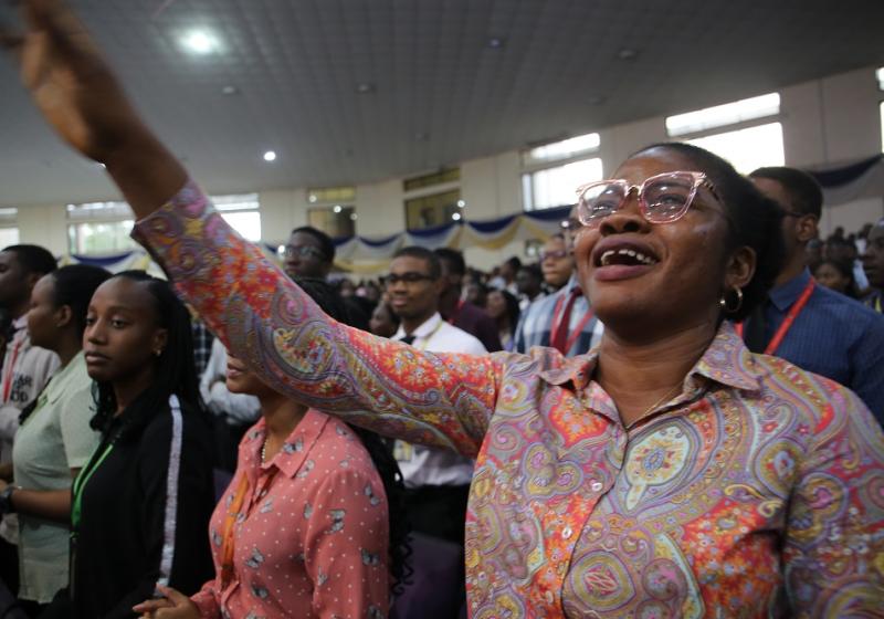 A Cross Section Of Faculty Staff And Students During A Praise Session