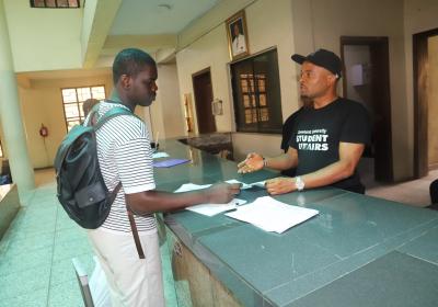 A Cleared Student Undergoing His Registration To Get Into His Allotted Room