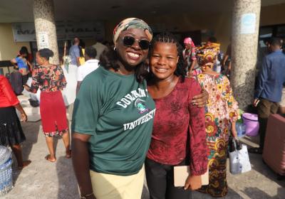 Happy Dean Of Students Mrs. Shola Coker Welcoming One Of Her Returning Students As She Supervises The Resumption Protocols