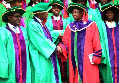Vice Chancellor Professor Abiodun H. Adebayo Congratulating Professor Ailemen O. Ikpefan For The Success Of The 29th Inaugural