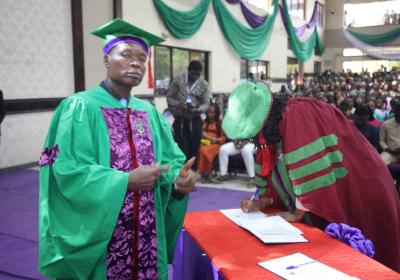 A Representative Of The Ph.d Students Also Signing The Register On Behalf Of Others